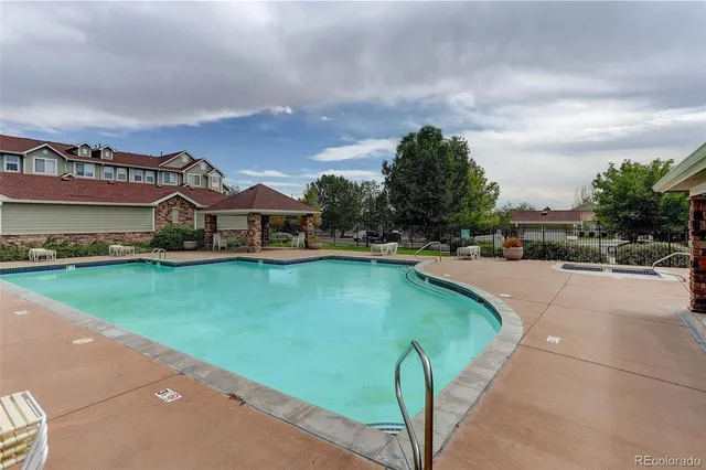 a view of a garden with houses