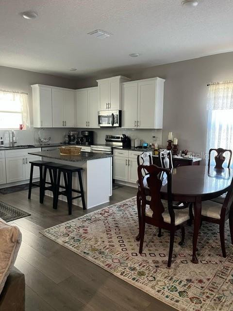 15610 Southwest 40th Terrace Ocala, FL 34473 - Photo 13 of 14 a view of a dining room with furniture