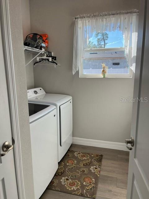 15610 Southwest 40th Terrace Ocala, FL 34473 - Photo 3 of 14 a utility room with dryer and washer
