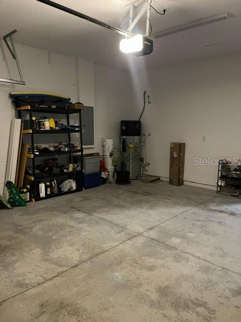 15610 Southwest 40th Terrace Ocala, FL 34473 - Photo 9 of 14 a view of a garage with storage