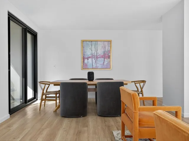 a view of workspace with wooden floor