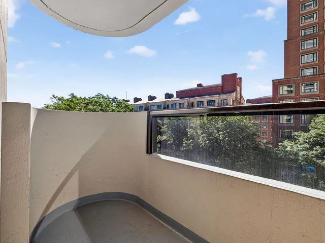 a view of a balcony with lake view and mountain view
