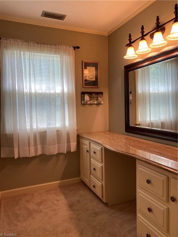 239 Pine Valley Road Mocksville, NC 27028 - Photo 18 of 29 Laundry room off den by the garage. Pantry and washtub