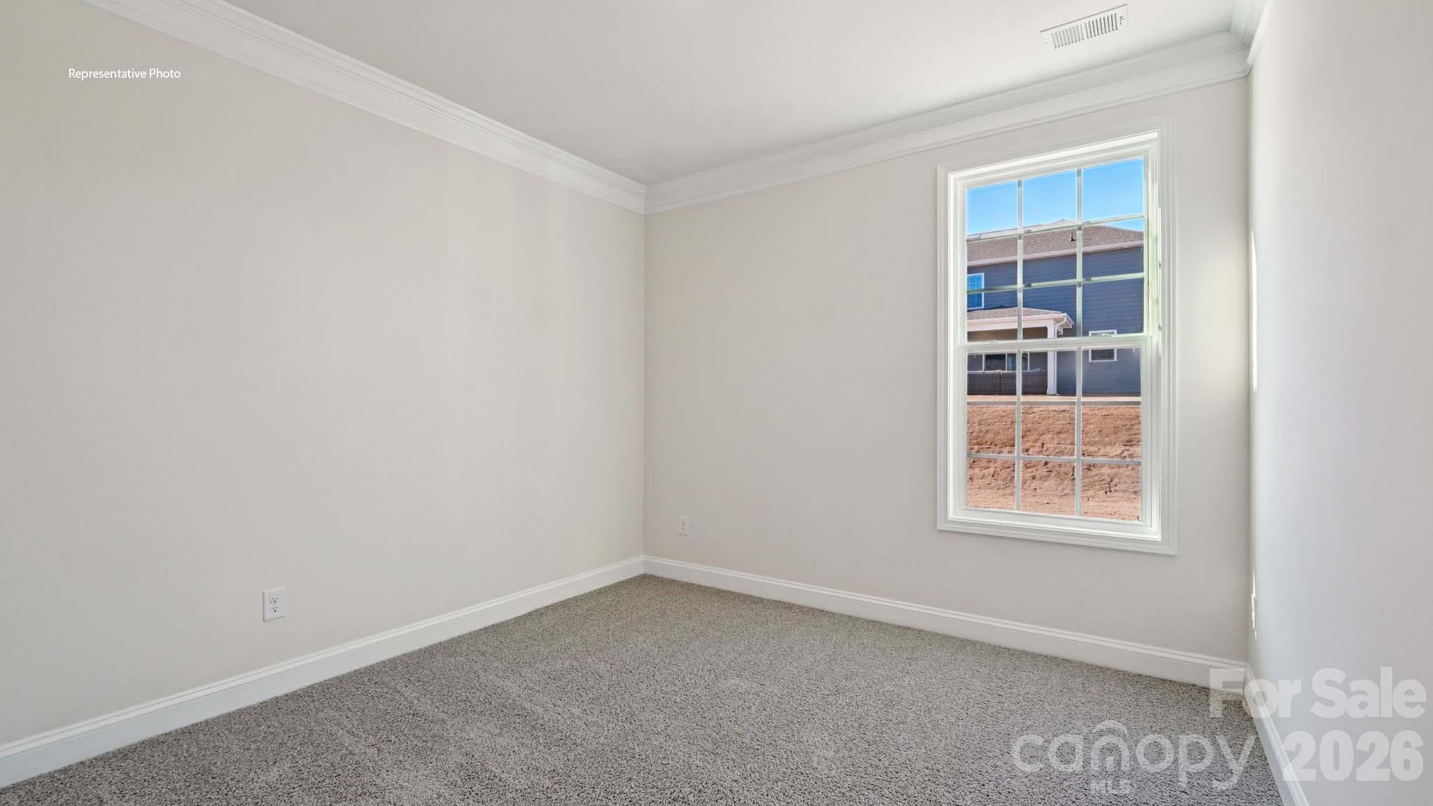 7609 Bainbridge Road Sherrills Ford, NC 28673 - Photo 18 of 36 an empty room with a window
