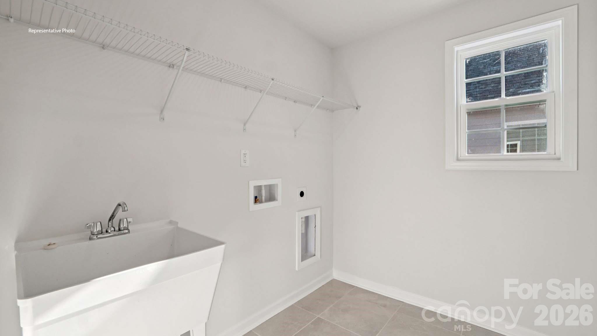 7609 Bainbridge Road Sherrills Ford, NC 28673 - Photo 23 of 36 a bathroom with a sink and a tub
