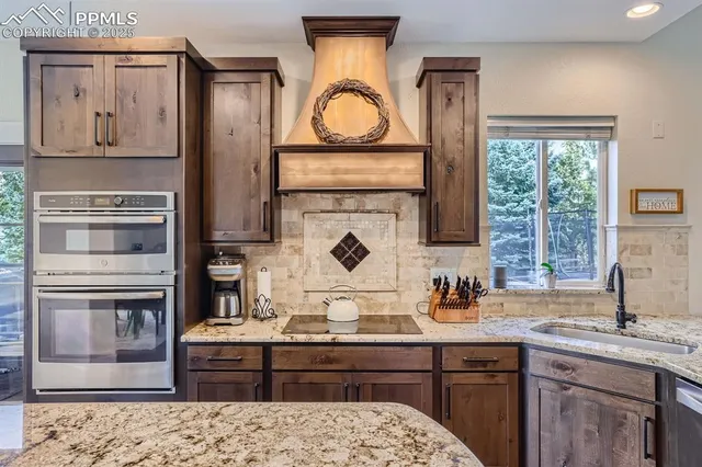 a view of living room with furniture and fireplace