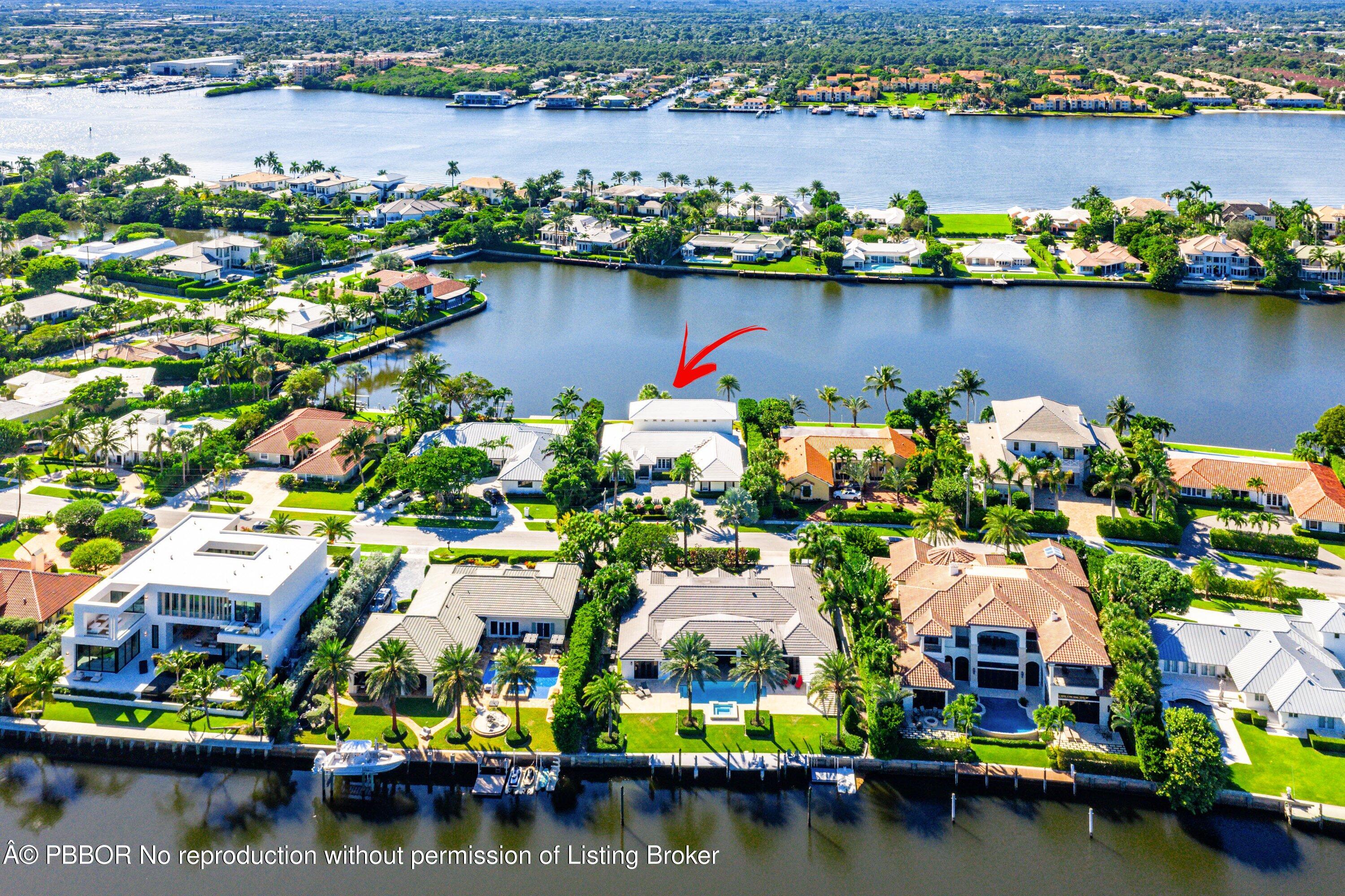 50 Spoonbill Road Lantana, FL 33462 - Photo 3 of 37 an aerial view of residential houses with outdoor space and boats