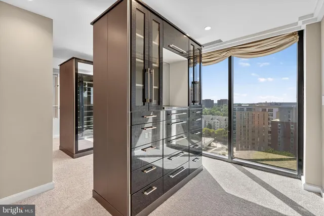 a view of an empty room with a balcony