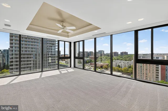 a bathroom with a tub sink mirror and shower