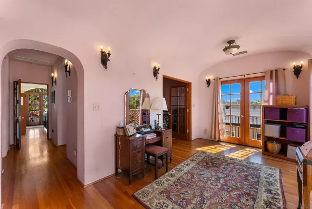 a living room with furniture rug and window