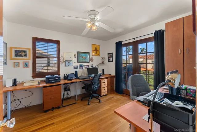 a bathroom with a sink toilet and mirror