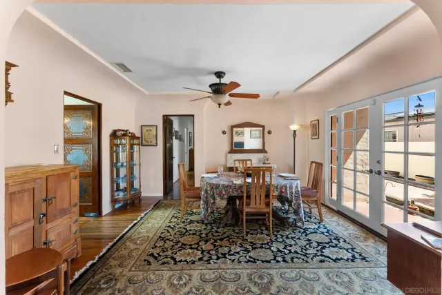 a view of a livingroom with furniture window and wooden floor
