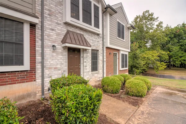a house view with a garden space