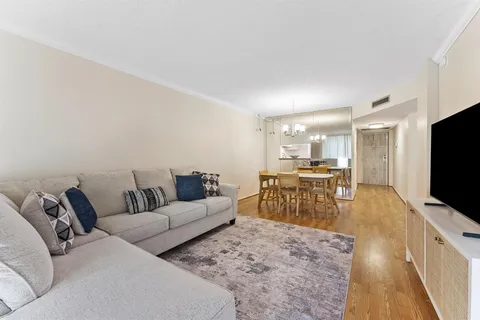 a kitchen with cabinets and appliances
