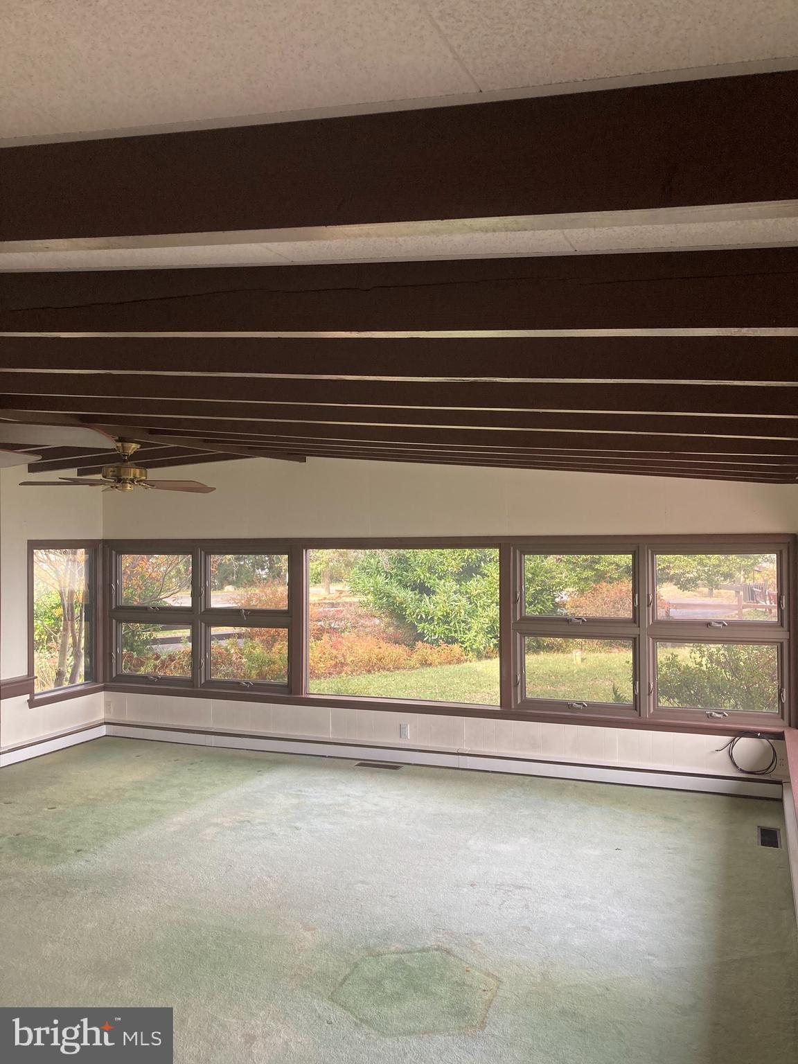 3911 Bayside Drive Edgewater, MD 21037 - Photo 24 of 28 Exposed beams with a slight vault and ceiling fans