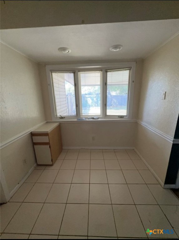 1417 Camilla Road Killeen, TX 76549 - Photo 13 of 22 a room with a window and a table chair