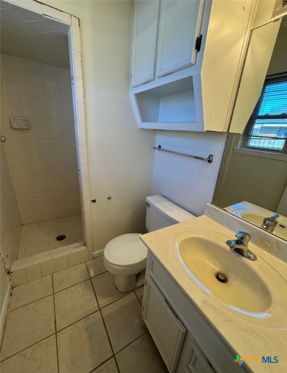 1417 Camilla Road Killeen, TX 76549 - Photo 19 of 22 a bathroom with a sink a toilet and shower