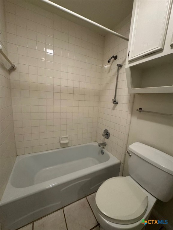 1417 Camilla Road Killeen, TX 76549 - Photo 20 of 22 a white toilet and tub sitting next to a bathroom sink