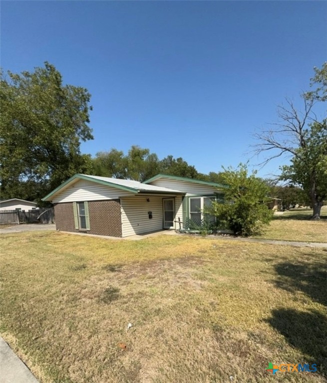 1417 Camilla Road Killeen, TX 76549 - Photo 2 of 22 a front view of a house with a yard