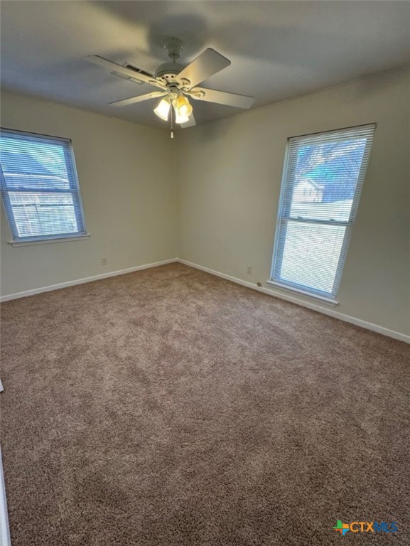 1417 Camilla Road Killeen, TX 76549 - Photo 8 of 22 a view of an empty room with a window