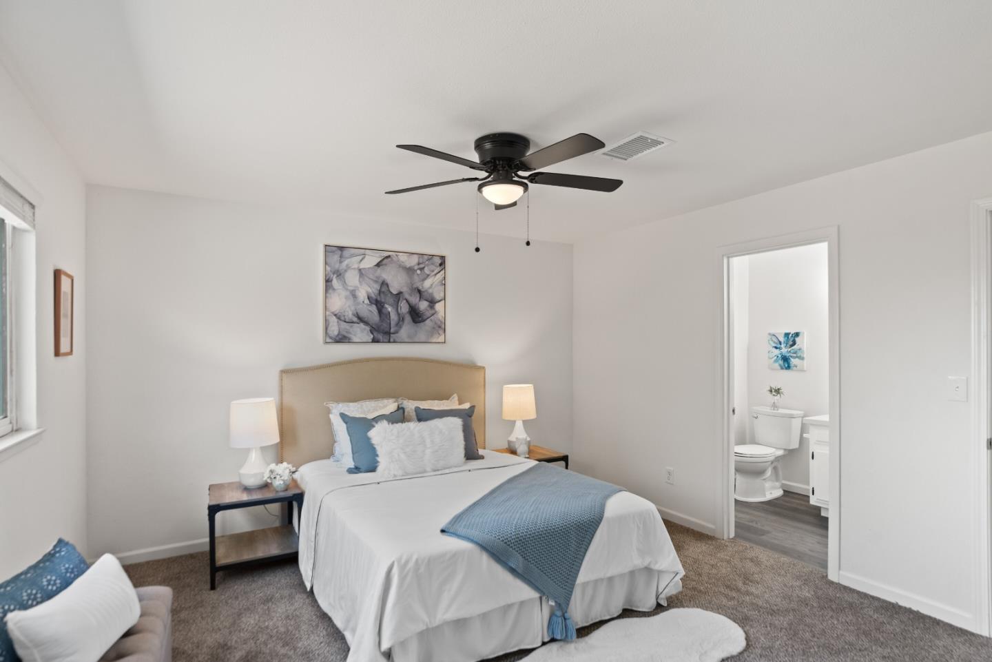 773 Andrea Way Pittsburg, CA 94565 - Photo 17 of 35 a bedroom with a bed and a painting on the wall