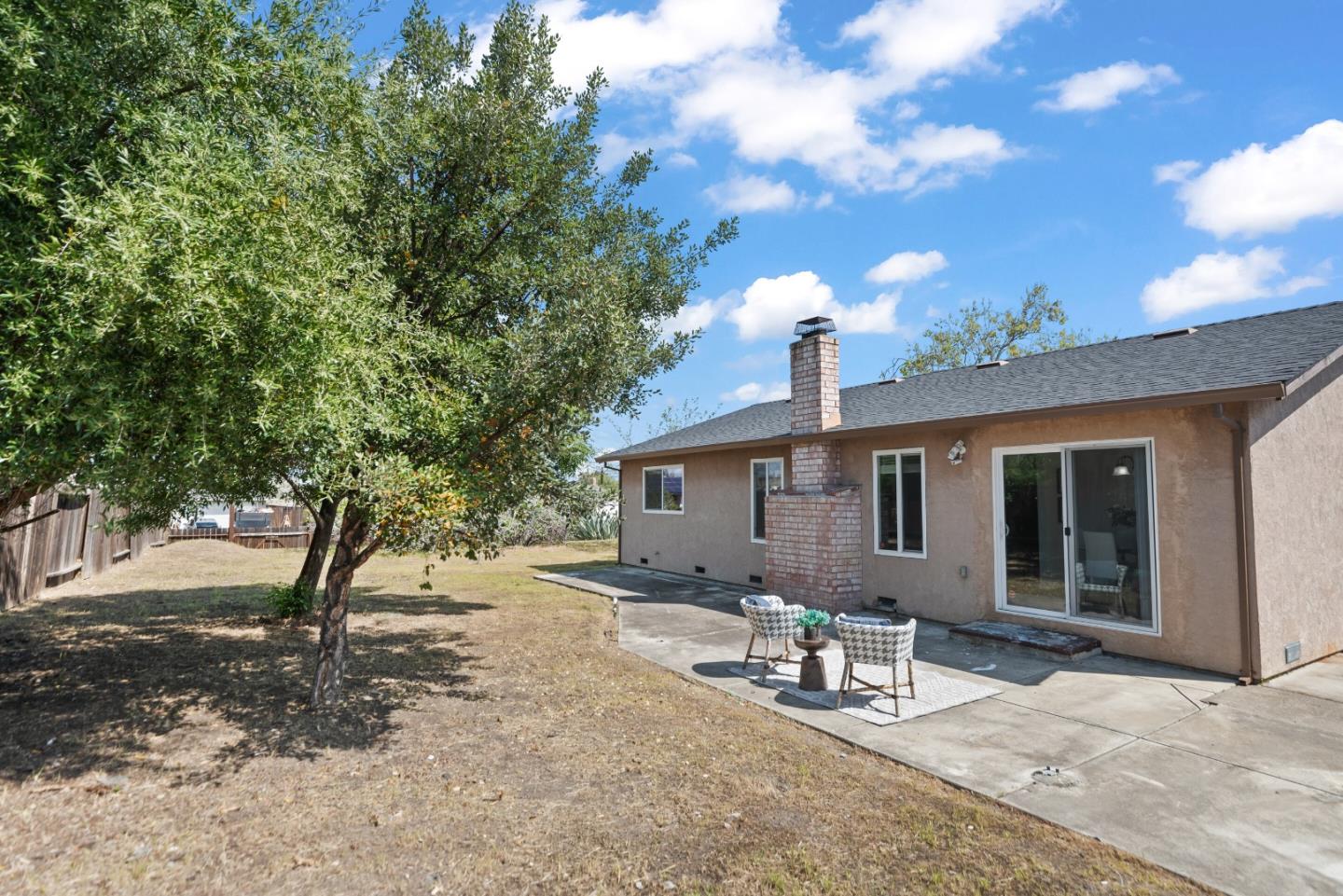 773 Andrea Way Pittsburg, CA 94565 - Photo 23 of 35 a backyard of a house with table and chairs