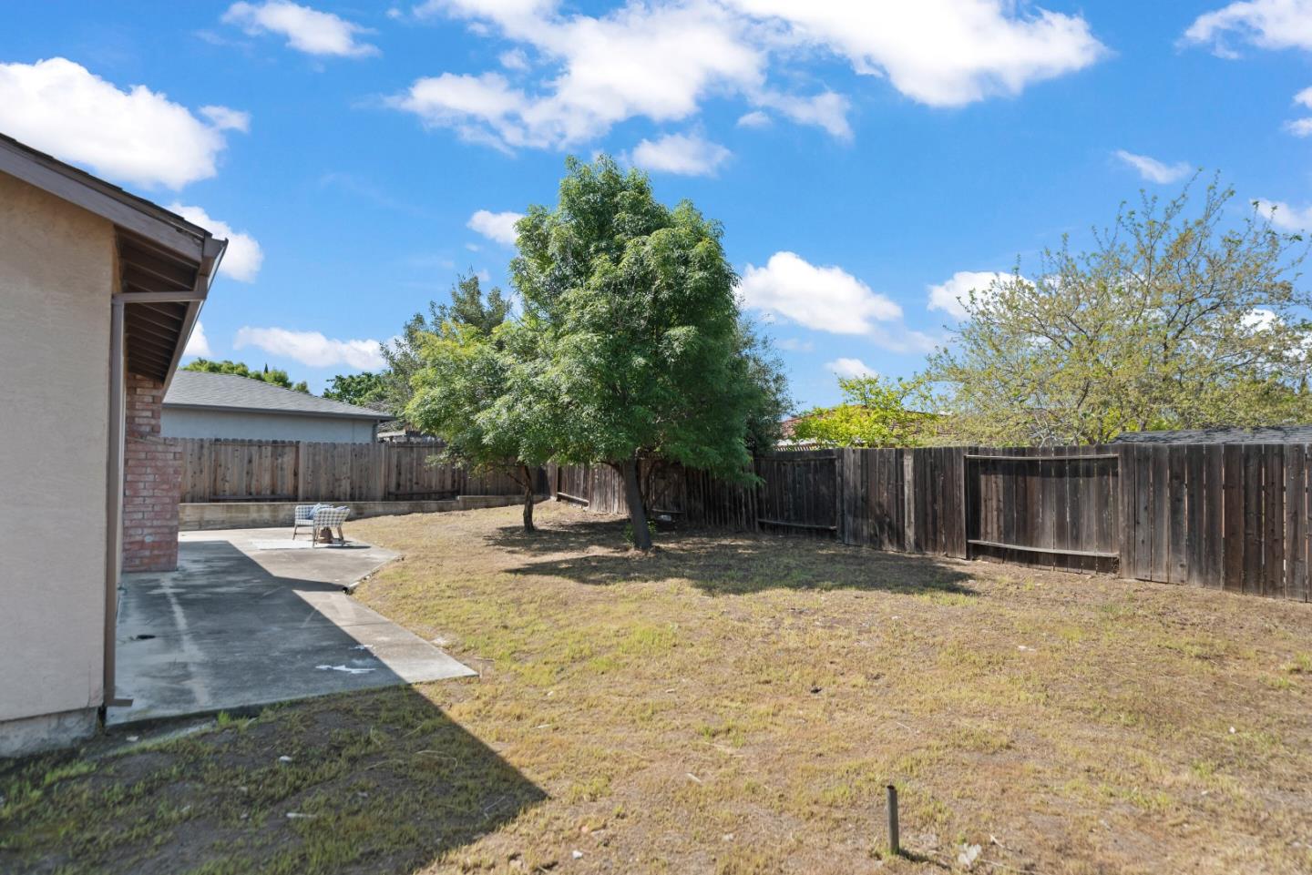 773 Andrea Way Pittsburg, CA 94565 - Photo 25 of 35 a backyard of a house with table and chairs