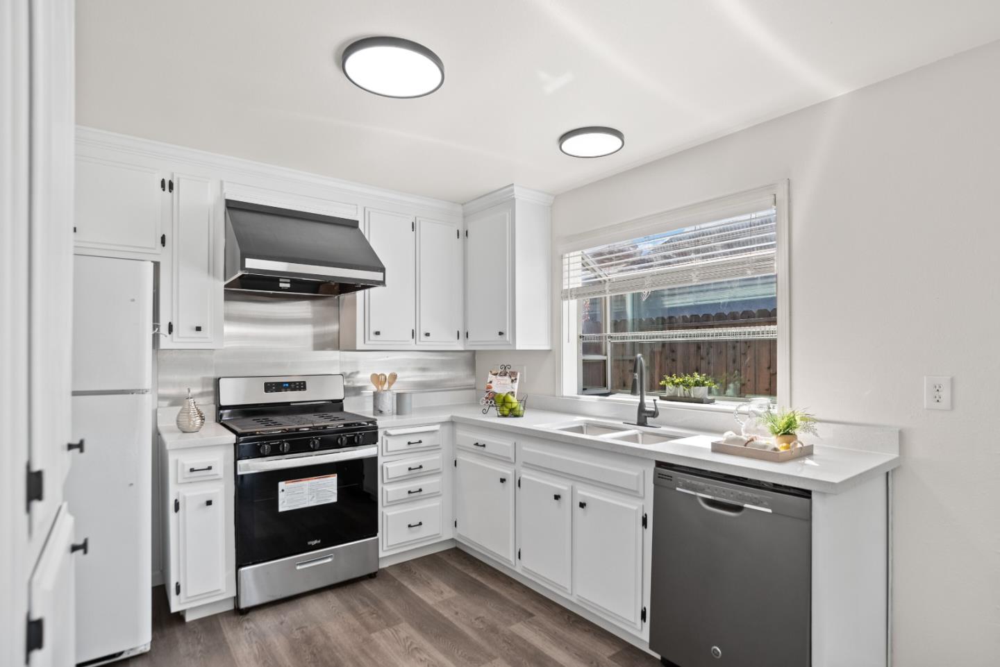 773 Andrea Way Pittsburg, CA 94565 - Photo 10 of 35 a kitchen with appliances a sink and a window