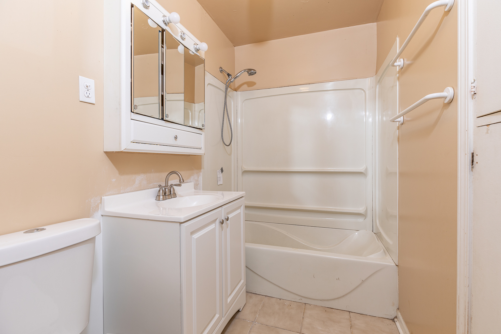 18 Greenbriar Road Montgomery, IL 60538 - Photo 15 of 27 a bathroom with a granite countertop sink a mirror and a bathtub