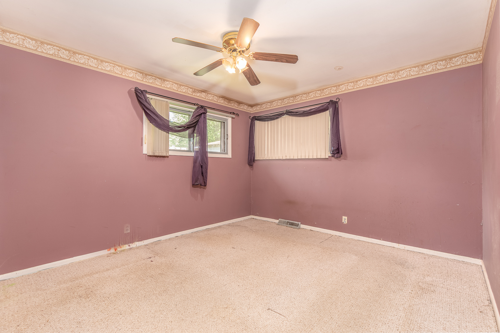 18 Greenbriar Road Montgomery, IL 60538 - Photo 16 of 27 an empty room with windows and fan