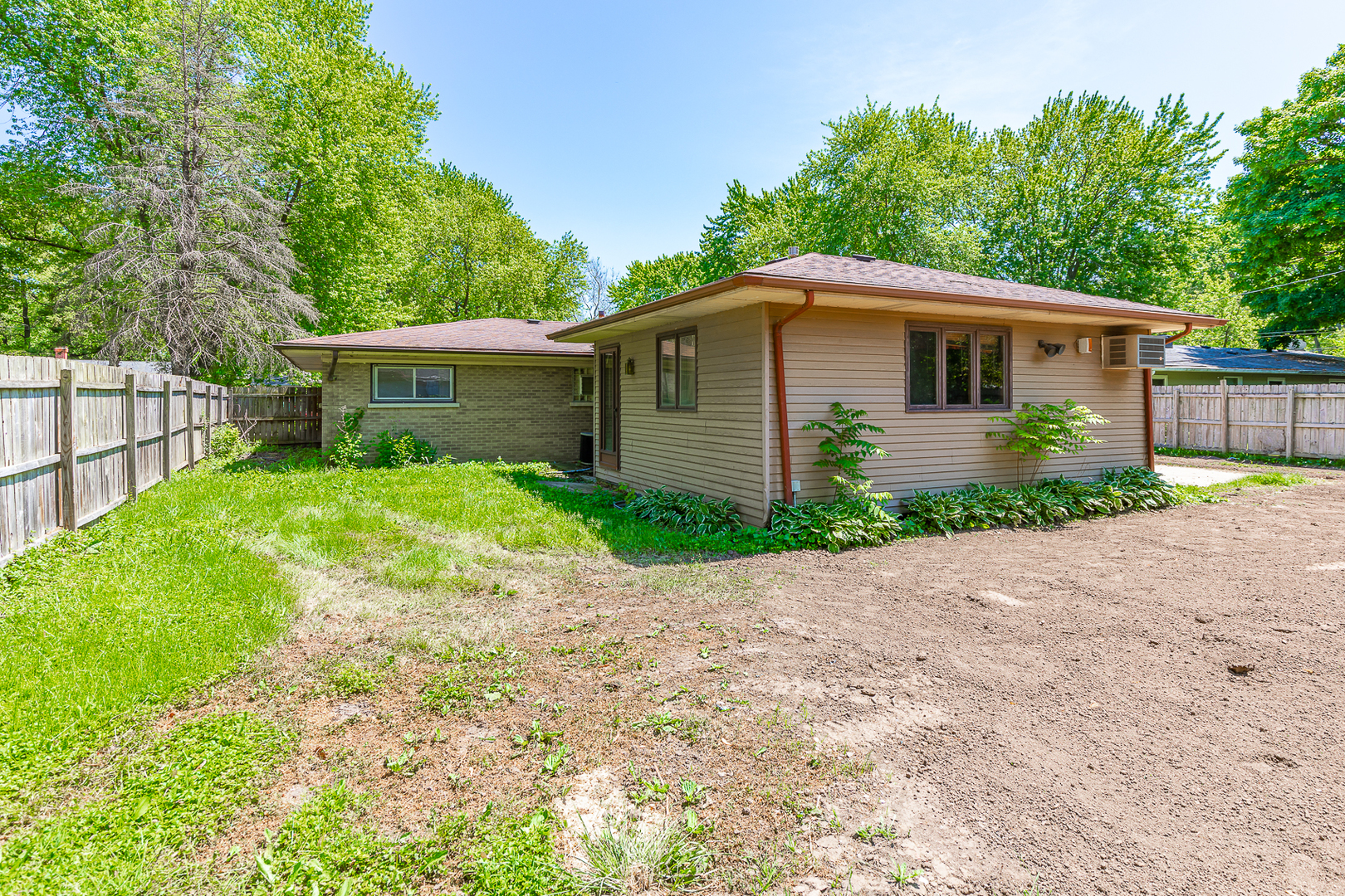 18 Greenbriar Road Montgomery, IL 60538 - Photo 24 of 27 a front view of a house with garden
