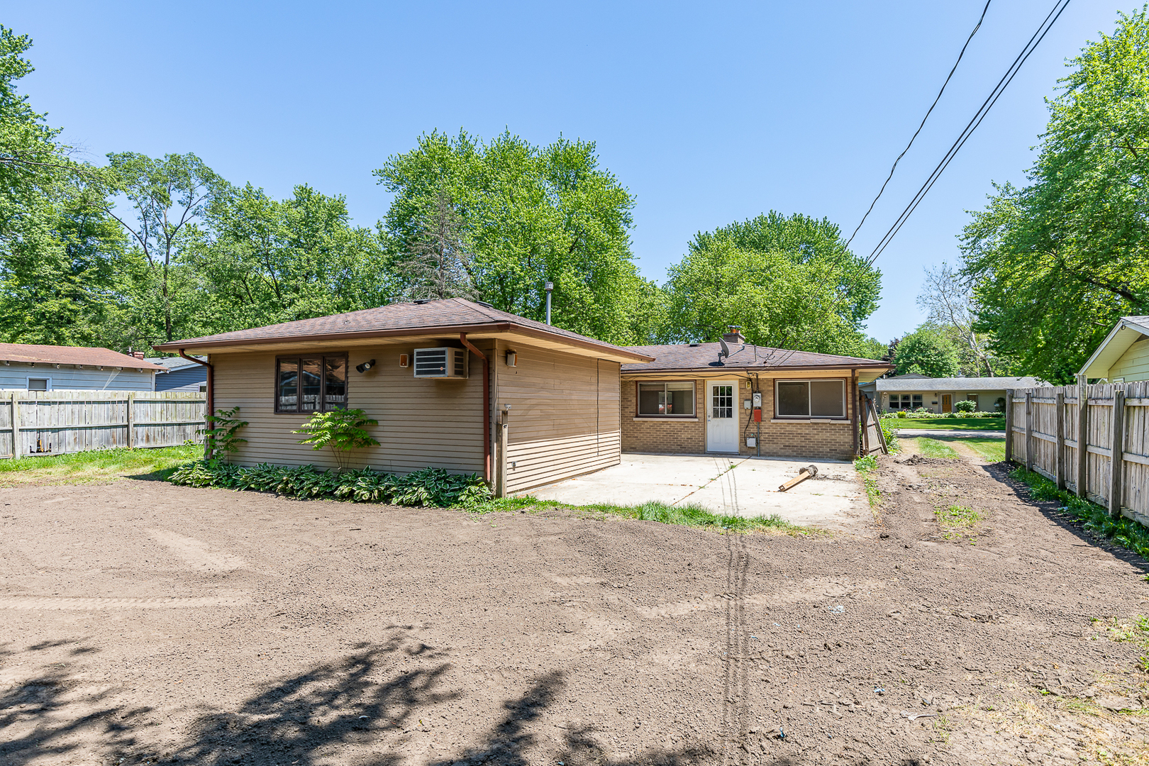 18 Greenbriar Road Montgomery, IL 60538 - Photo 26 of 27 a view of a house with a yard and large trees