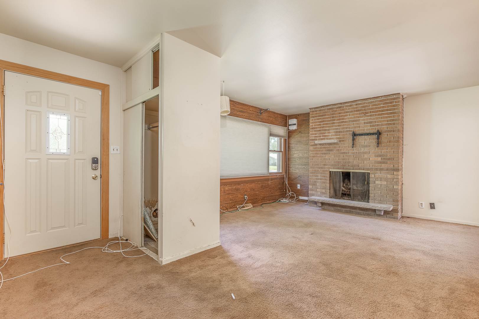 18 Greenbriar Road Montgomery, IL 60538 - Photo 6 of 27 an empty room with windows and fireplace