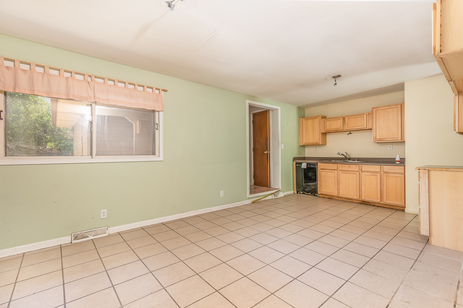 18 Greenbriar Road Montgomery, IL 60538 - Photo 8 of 27 a view of a kitchen with a sink dishwasher and a microwave oven