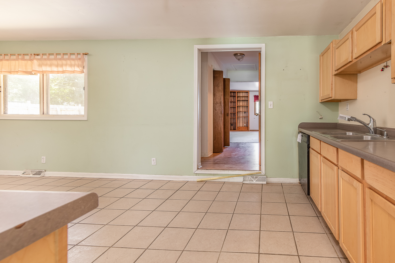 18 Greenbriar Road Montgomery, IL 60538 - Photo 10 of 27 a view of a kitchen with a sink and a window