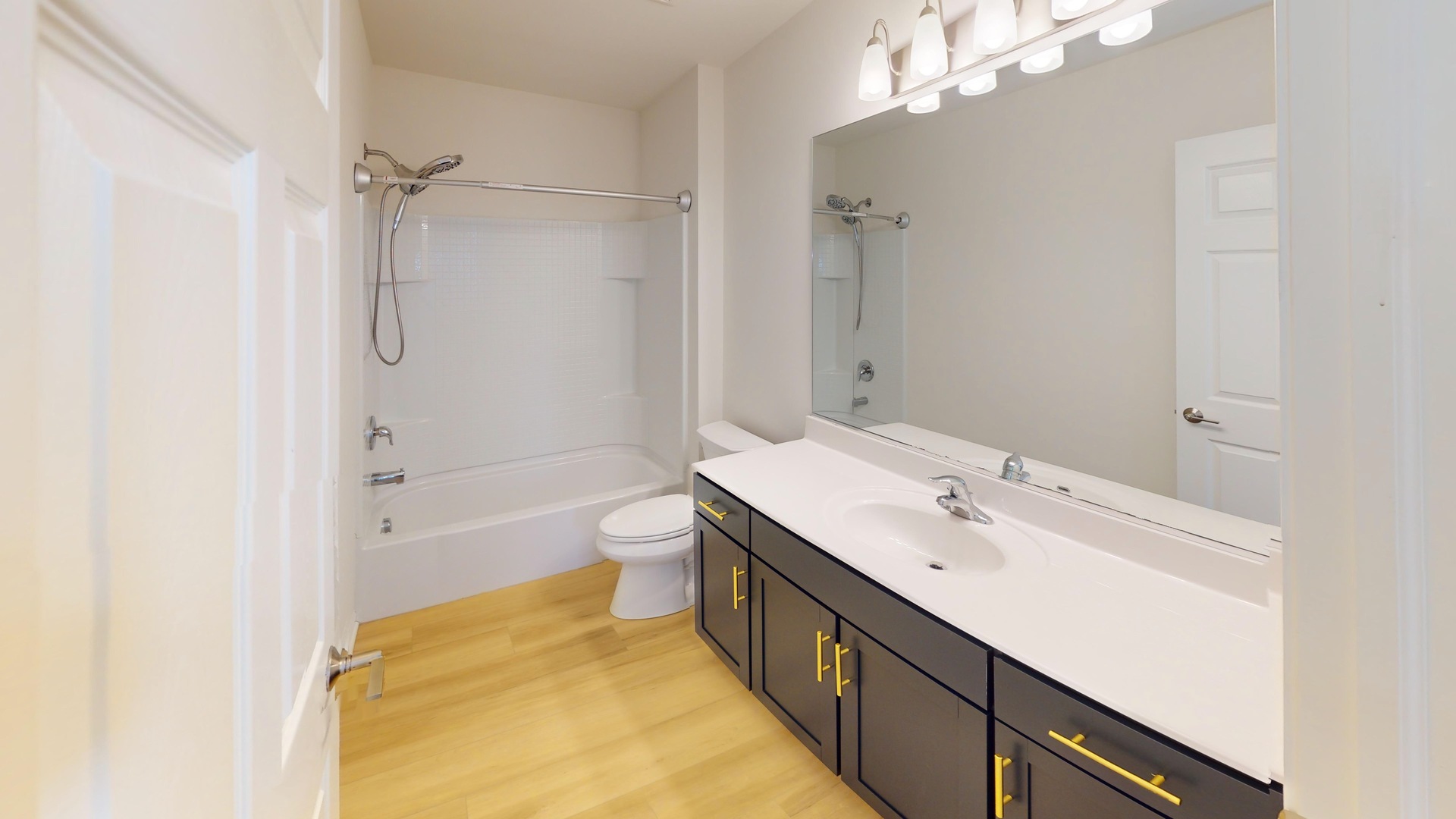 219 Deer Run Trail Poplar Grove, IL 61065 - Photo 19 of 30 a bathroom with a sink a toilet and shower