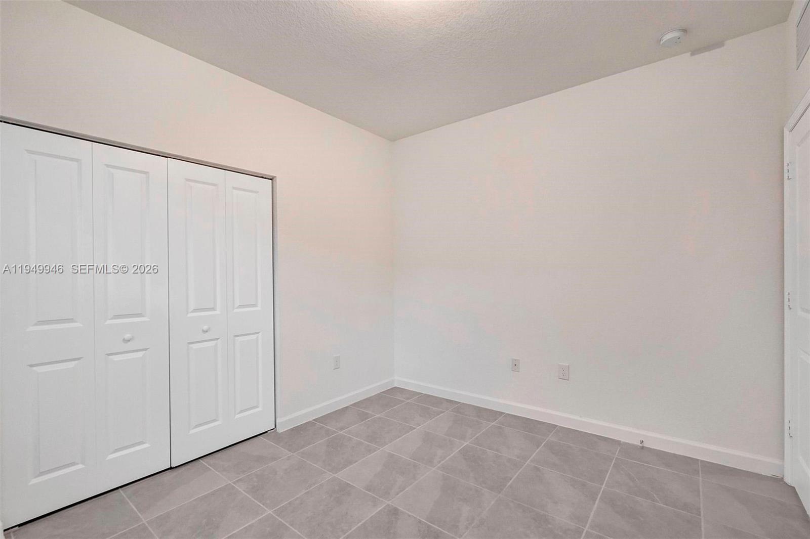 13405 Southwest 285th Street Homestead, FL 33033 - Photo 20 of 59 a view of an empty room