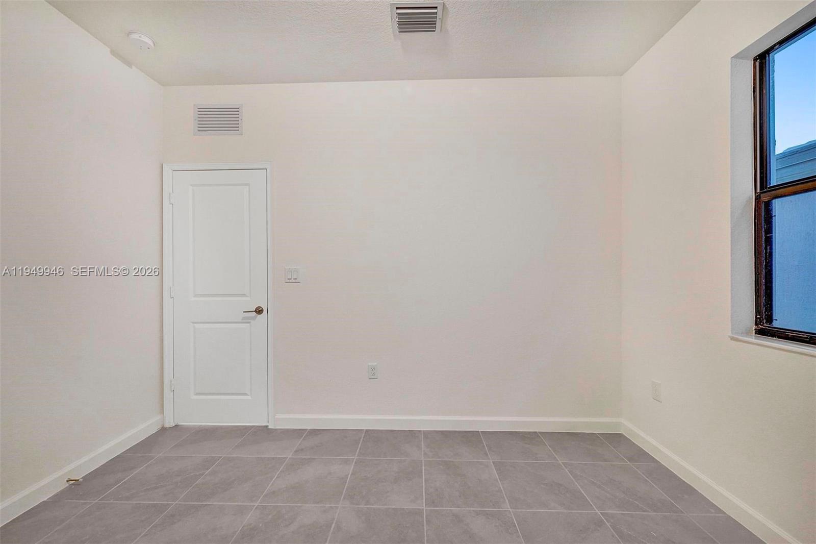 13405 Southwest 285th Street Homestead, FL 33033 - Photo 24 of 59 a view of an empty room