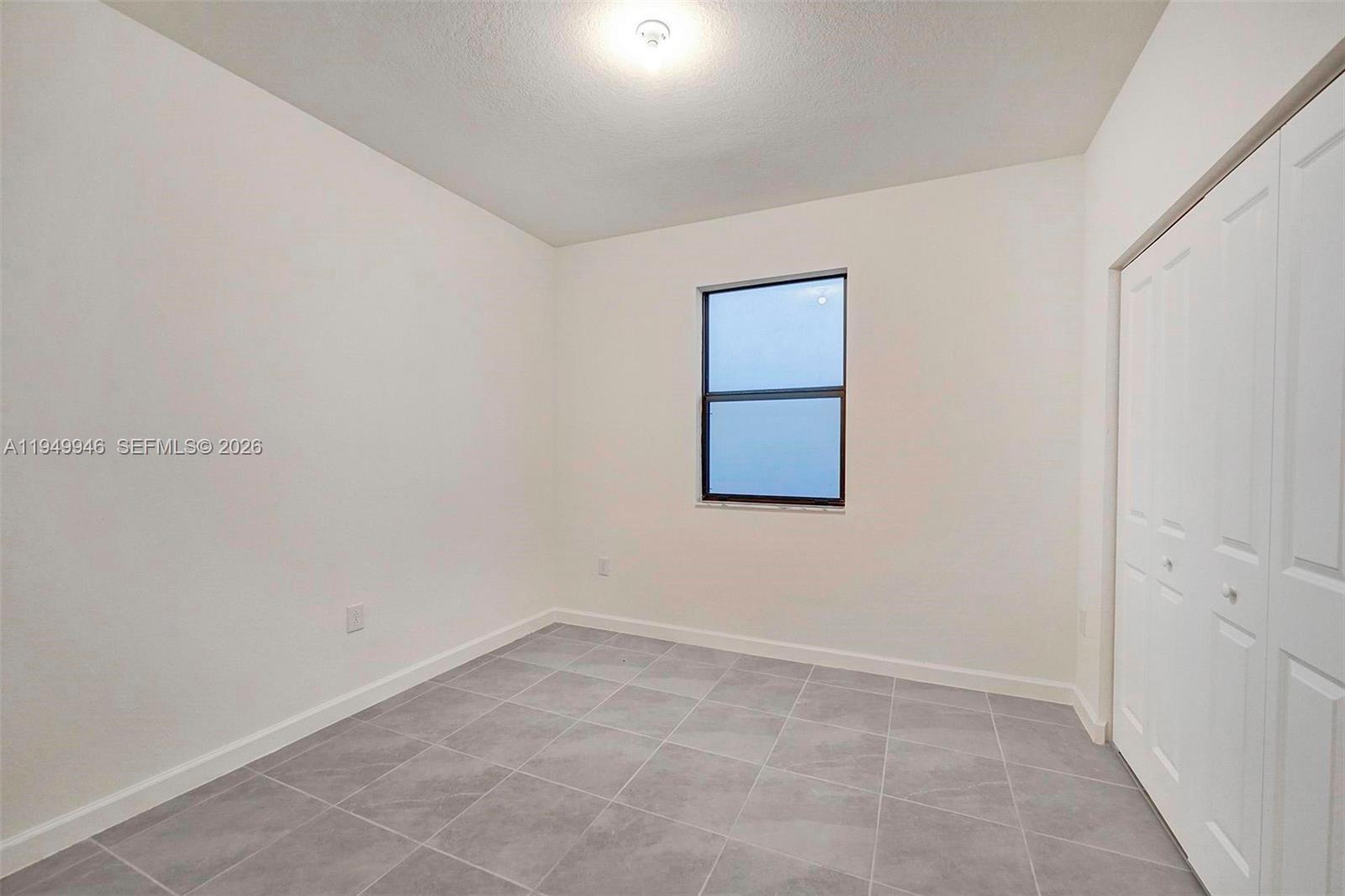 13405 Southwest 285th Street Homestead, FL 33033 - Photo 25 of 59 a view of an empty room