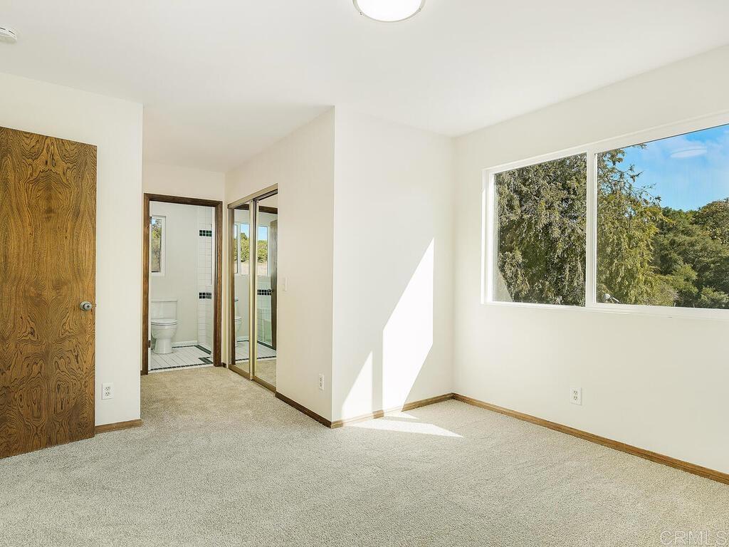 2844 Live Oak Park Road Fallbrook, CA 92028 - Photo 30 of 65 wooden floor in an empty room with a window
