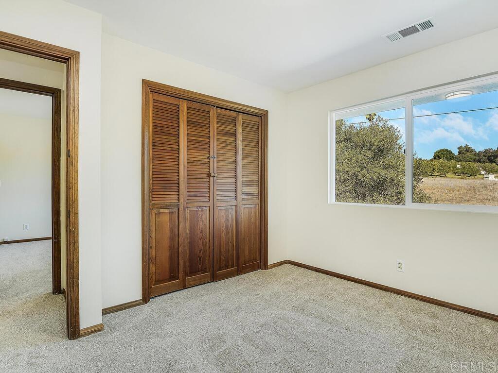 2844 Live Oak Park Road Fallbrook, CA 92028 - Photo 37 of 65 an empty room with a window