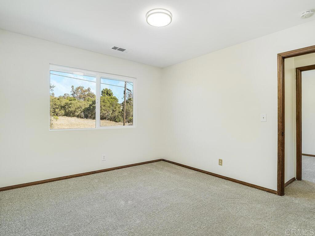 2844 Live Oak Park Road Fallbrook, CA 92028 - Photo 39 of 65 an empty room with a window