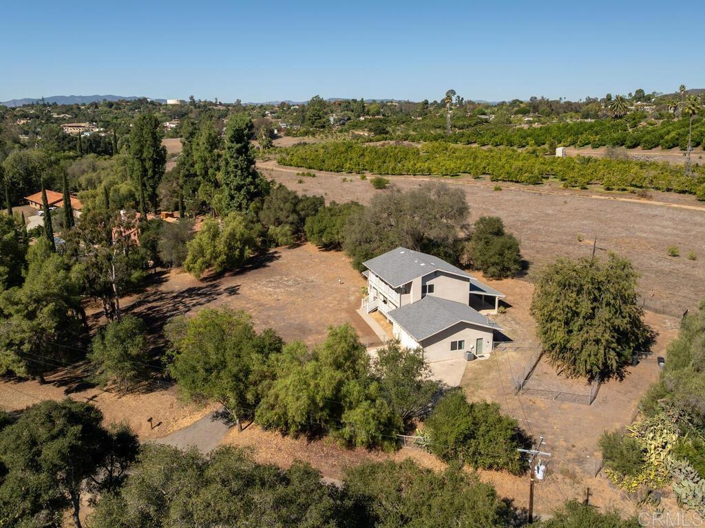 2844 Live Oak Park Road Fallbrook, CA 92028 - Photo 57 of 65 an aerial view of a house with a lake view