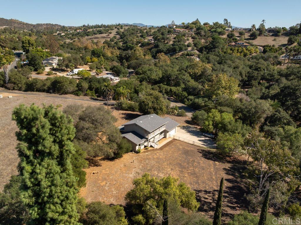 2844 Live Oak Park Road Fallbrook, CA 92028 - Photo 61 of 65 an aerial view of a house with a yard