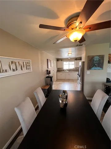 a view of a livingroom with furniture and window