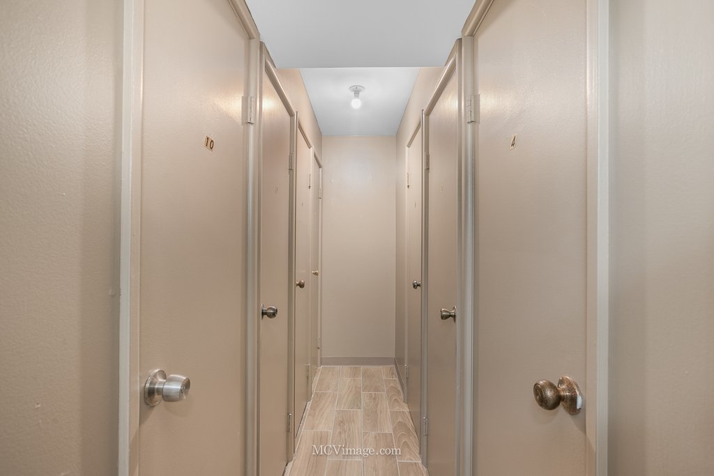 19360 Wolf Road, Unit 10 Mokena, IL 60448 - Photo 18 of 24 a bathroom with a glass door shower and sink