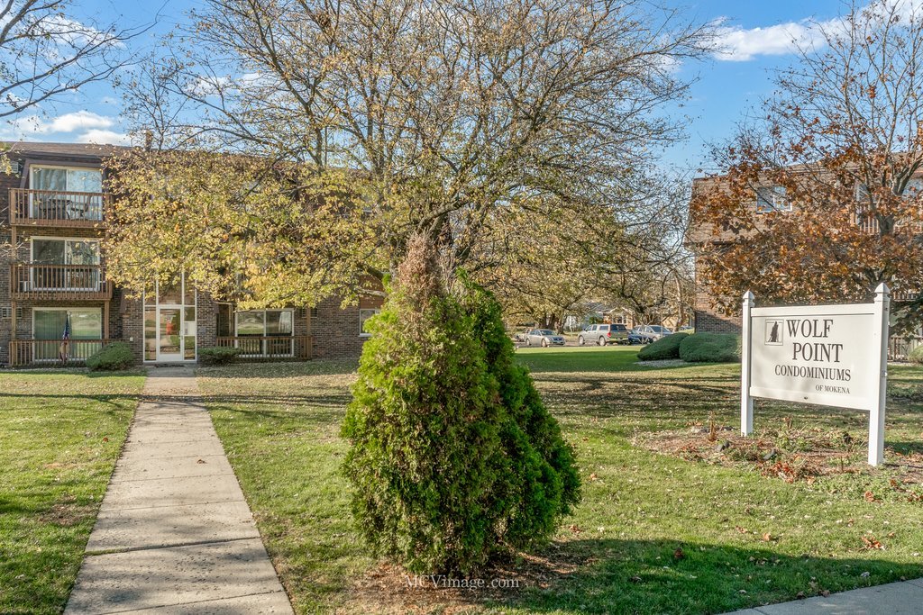 19360 Wolf Road, Unit 10 Mokena, IL 60448 - Photo 2 of 24 a view of a street with a building in the background