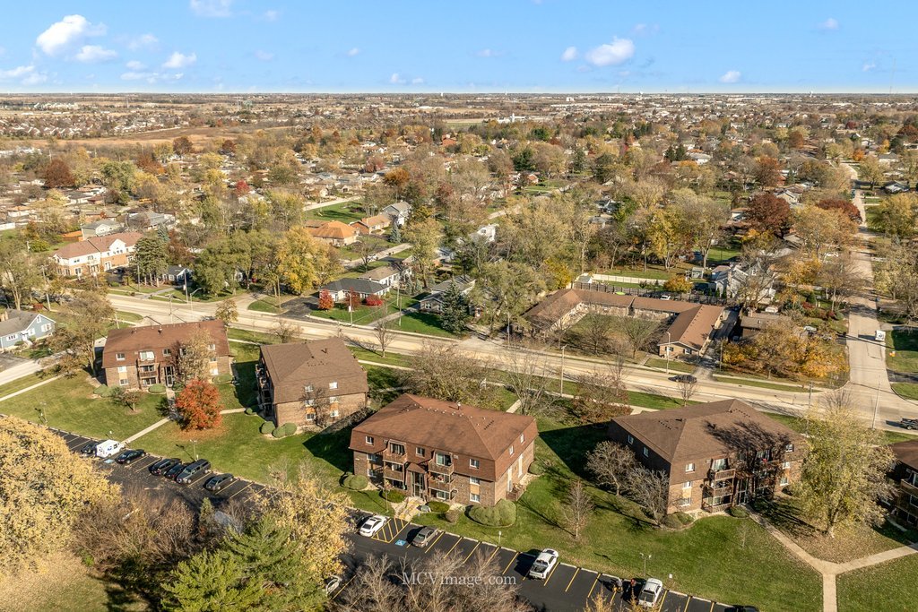 19360 Wolf Road, Unit 10 Mokena, IL 60448 - Photo 3 of 24 an aerial view of residential houses with outdoor space