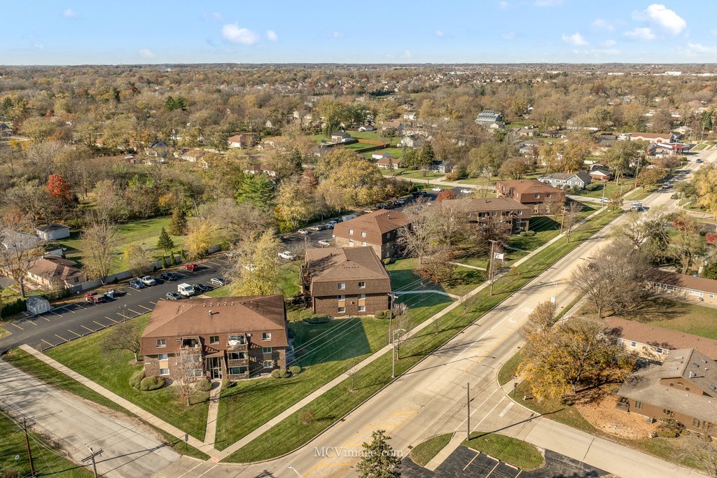 19360 Wolf Road, Unit 10 Mokena, IL 60448 - Photo 5 of 24 an aerial view of residential houses with outdoor space