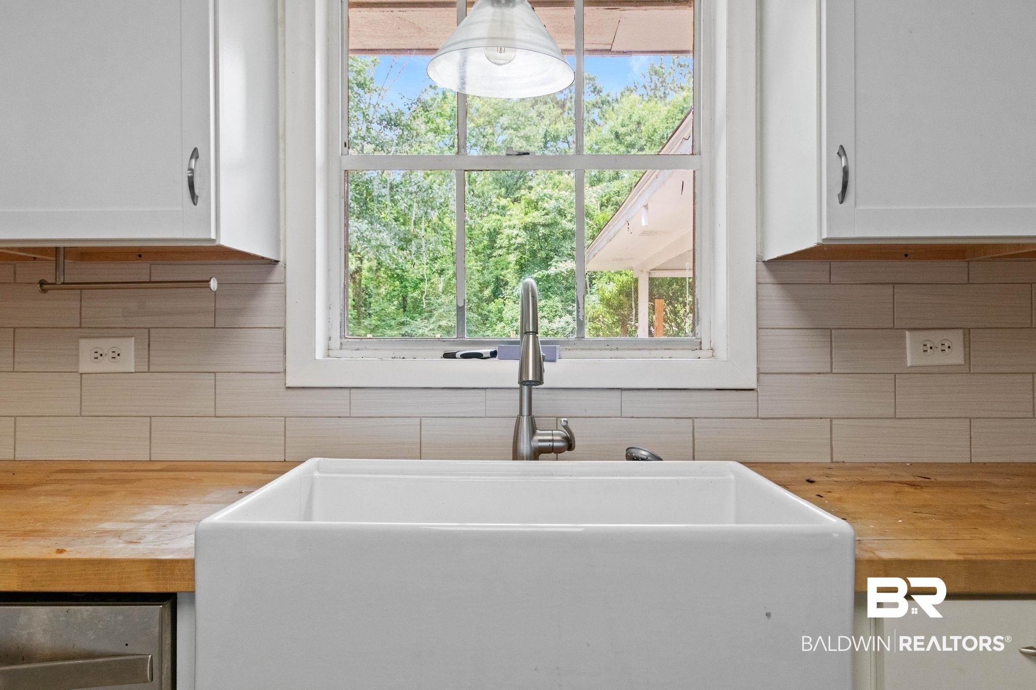 384 Old Bratt Road Atmore, AL 36502 - Photo 19 of 64 White farmhouse sink with a gooseneck faucet